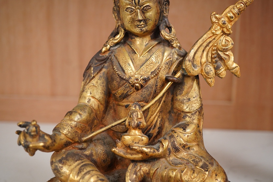 A gilt bronze figure of Padmasambhava, 22cm